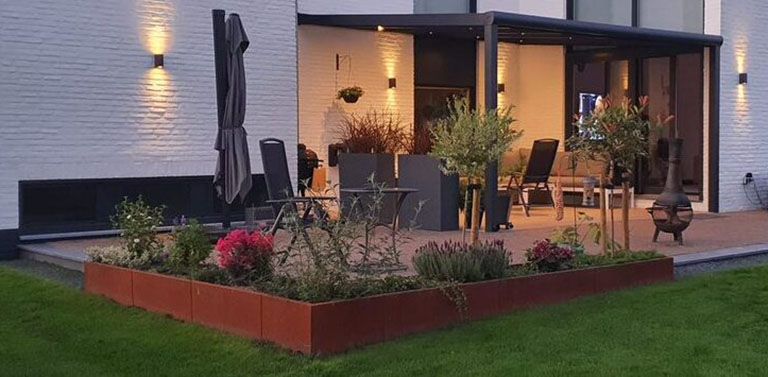 Crear ambiente con acero corten en el jardín